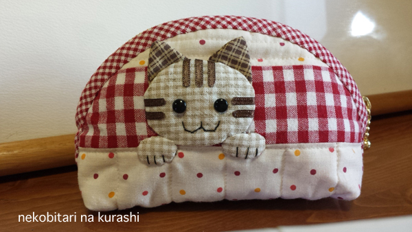 ねこねこぽーち
