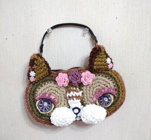 画像1: 編みゅーずTM-yo：猫顔 スマホケース (1)