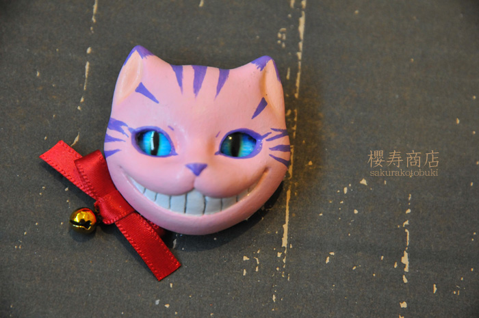 猫顔ブローチ